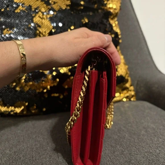 SOLD

Yves Saint Laurent Red Chevron Leather Wallet on Chain - Picture 2 of 13